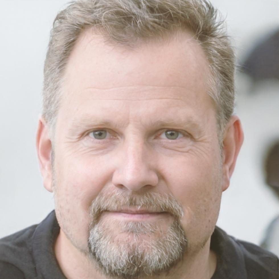 Professional headshot of male program graduate